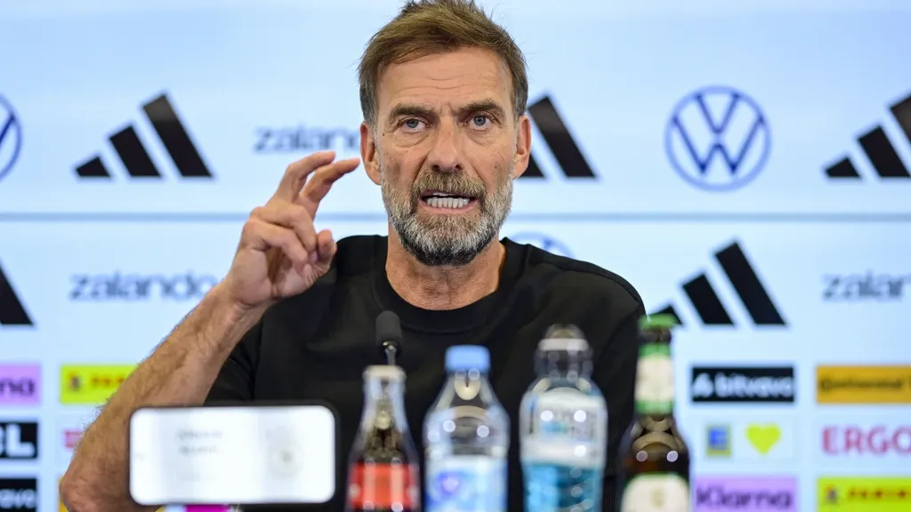 German national coach Klopp warns media: 'If you misbehave, I'm gone'